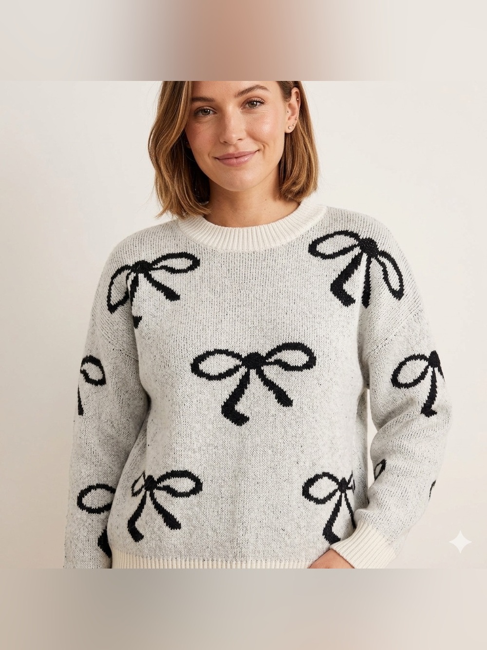 Pink Lily Cream Knit Sweater with Black Bow Motif